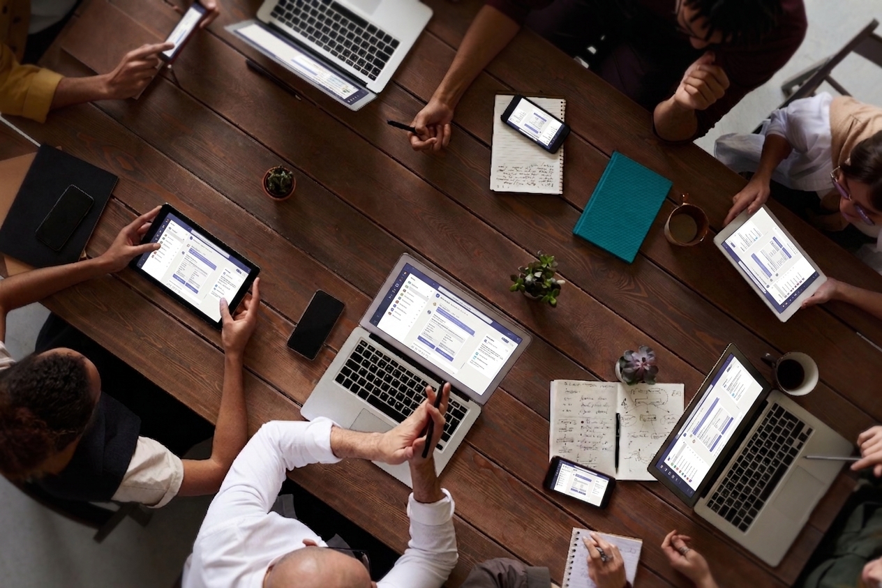 A team collaborating from different devices during a planning session